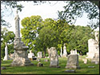 Elmwood Cemetery with grave stones and green trees